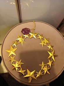 Contempory gold star christmas wreath