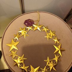 Contempory gold star christmas wreath