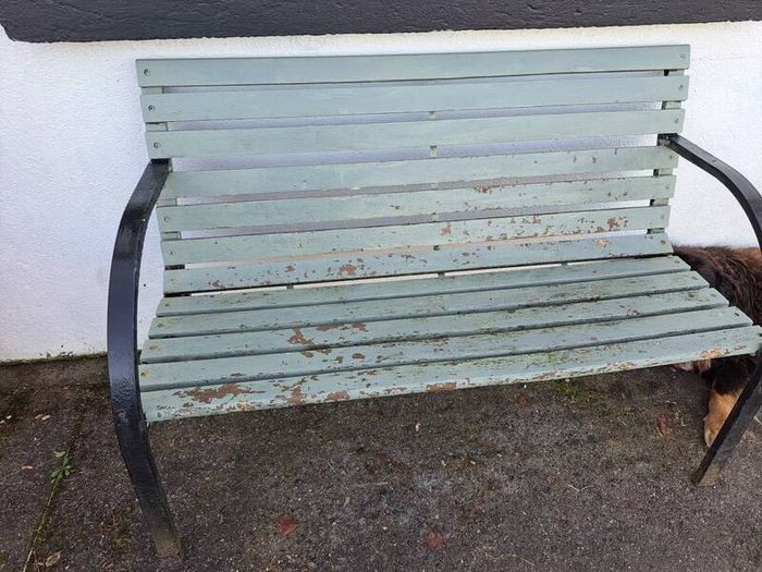 wooden bench with metal frame sides