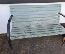 wooden bench with metal frame sides