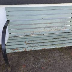 wooden bench with metal frame sides