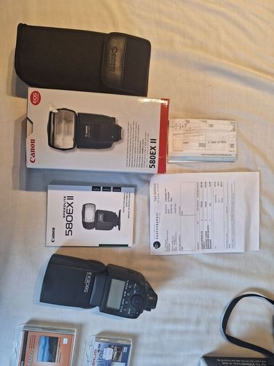 canon camera and pro lenses and a Pentax film system