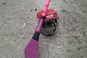 hurling helmet and hurl