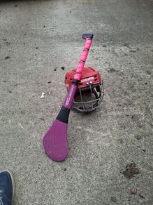 hurling helmet and hurl