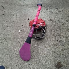 hurling helmet and hurl