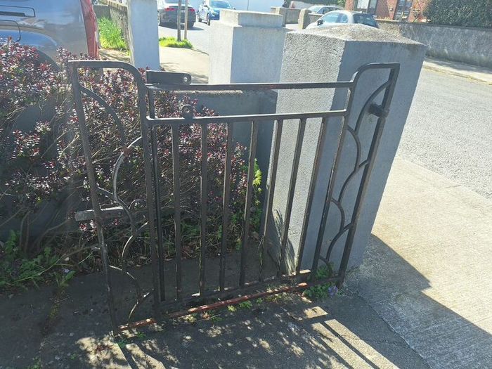 Black wrought iron mdtal double garden gates