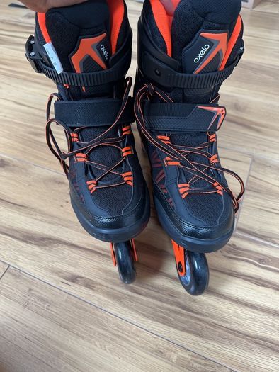 Rollerskates- Acid orange colour- intermediate skill set