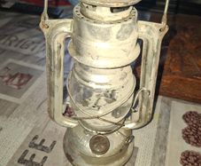 Beautiful Old Hurricane Lantern, Post Available, The lantern features a central glass globe protected by a metal cage, designed to shield the flame from wind while providing light