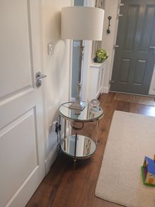 silver table lamp and table
