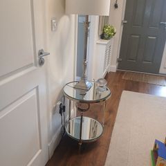 silver table lamp and table