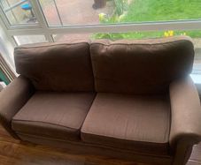 three-seater sofa and two armchairs