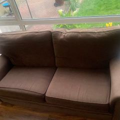 three-seater sofa and two armchairs