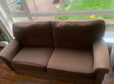 three-seater sofa and two armchairs