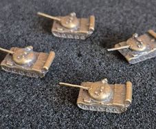 Miniature brass Soviet Russian T-55 tanks (4) aprox scale 1/350- 1/400 .