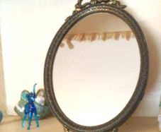 Attractive Brass standing mirror with ribbon bow