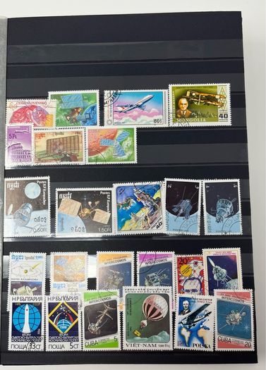 Ace Black 32 page/ 16 leaf Stamp Album with over 900 stamps. Thematic of Animals, Plants, Classic Cars, Space, Trains, Sport & Disney noted.