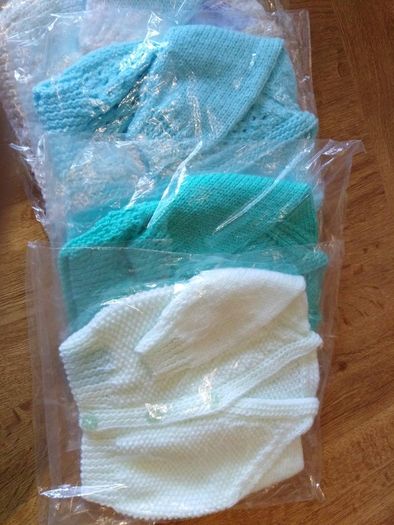 Beautiful hand knitted baby cardigans