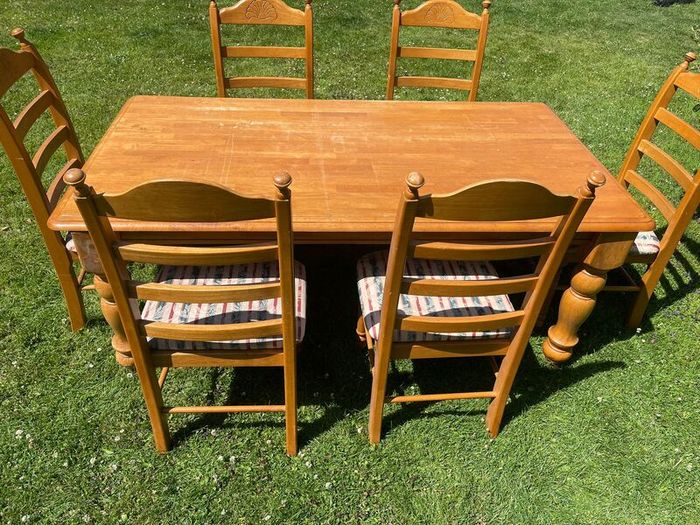Solid table and 6 chairs. Good condition