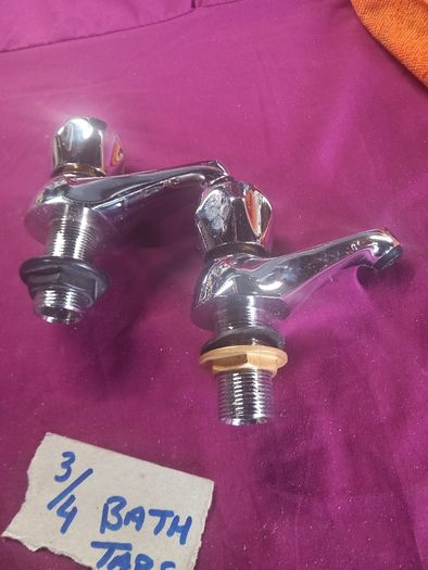 Old Bath taps gold colour