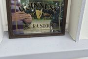 old small Guinness mirror