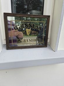 old small Guinness mirror