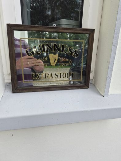 old small Guinness mirror