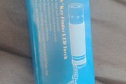 Laser light in tin case and book golf