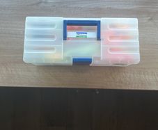 Shakespeare Fishing Tackle Box filled with lures and other fishing tackle