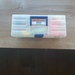 Shakespeare Fishing Tackle Box filled with lures and other fishing tackle