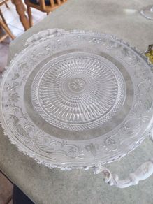 VINTAGE ANTIQUE Molded engraved crystal centerpiece resting on a two handled painted white metal patinated base.  Condition report:  Good condition