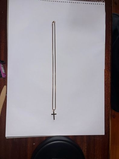 Gold cross.