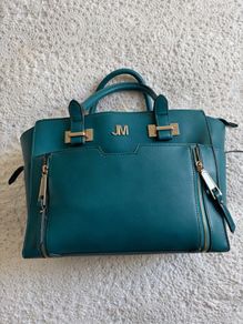 Teal handbag star by Julian