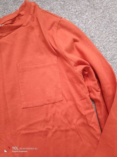 NEW.boy's long sleeve top. Age 6/7