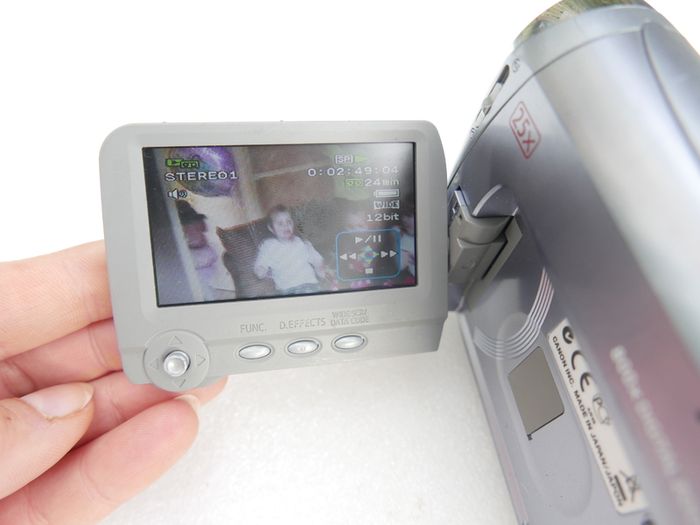 Canon MV900 MiniDV Camcorder with charger, works well.