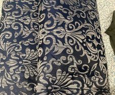 Pencil pleat curtains.