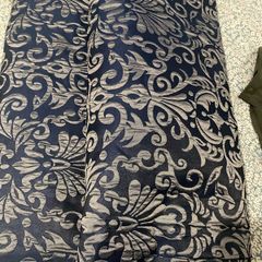 Pencil pleat curtains.