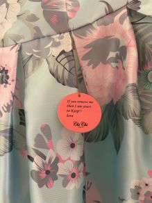 Chi Chi dress in size 16. New never worn . Pretty dress to wear on Weddings or any special occasion .