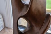 Lovers embrace kissing sculpture