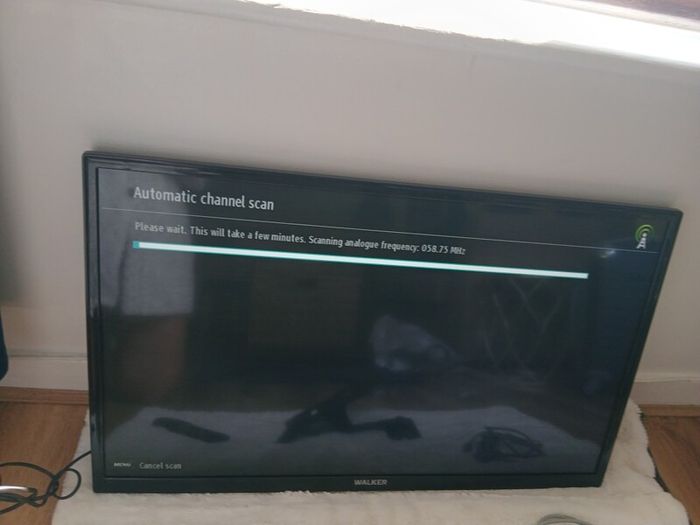 Walker brand flat screen tv 29inch in length  x17 inch heigth. Comes with original remot control, swivel mounted tv bracket and cables. .