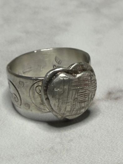 Handmade sterling silver love heart ring with trickles on the wide band. Size R