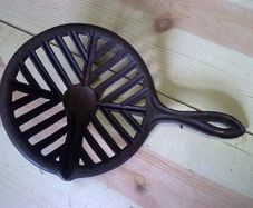 Old steaming iron. Irish farm bygone