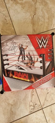 Signed WWE RAW ring and WWE2K18 PS4 game