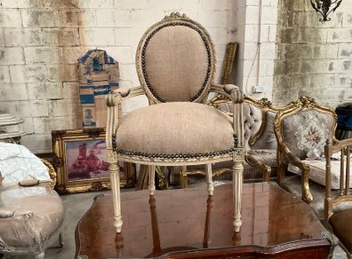 Carved wood chair with sacking material