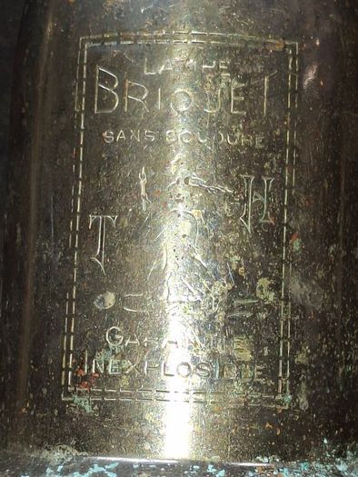 Antique French Lampe-Briquet lighter lamp manufactured by the brand TH. It is described as Sans Soudure The inscription Inexplosible indicates it was marketed as a safety product, often dating from before 1900s