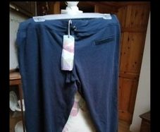 Navy. Penny's Capri tracksuit material pants draw string waist. new with tags.