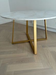 Laura James round dining table