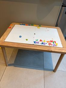 Trofast kids table with 2 bins