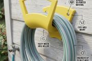 Wall mount hose holder for garden hose and more