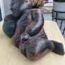 A large wooden statue of a sleeping Buddha Image 4
