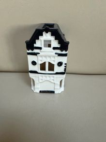 Rituals tealight holder in the shape of very first Rituals store in Amsterdam